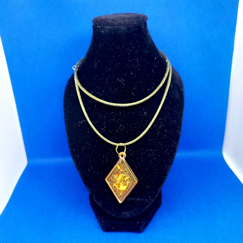 Diamond shaped pendant with crushed Chrysanthemum